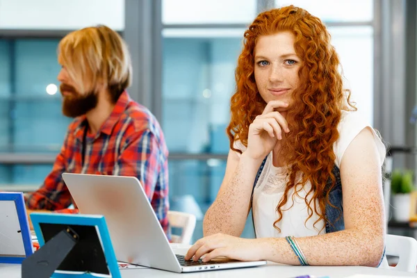 Creative business woman in office — Stock Photo, Image