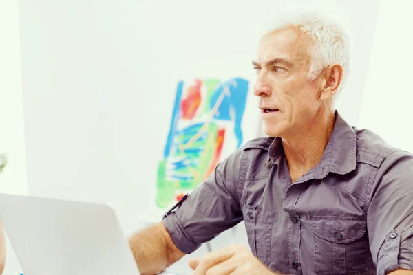 Handsome businessman in office — Stock Photo, Image