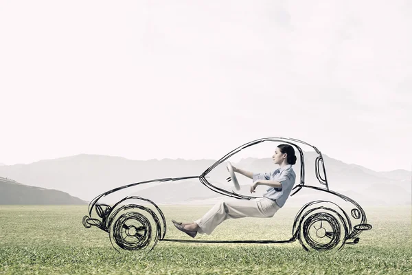 Woman driving old styled drawn car . Mixed media — Stock Photo, Image