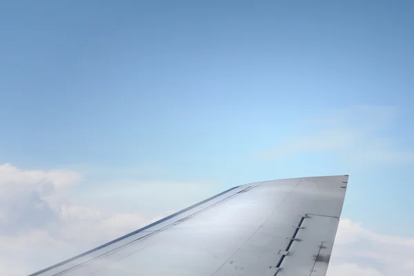 Airplane wing out of window . Mixed media — Stock Photo, Image