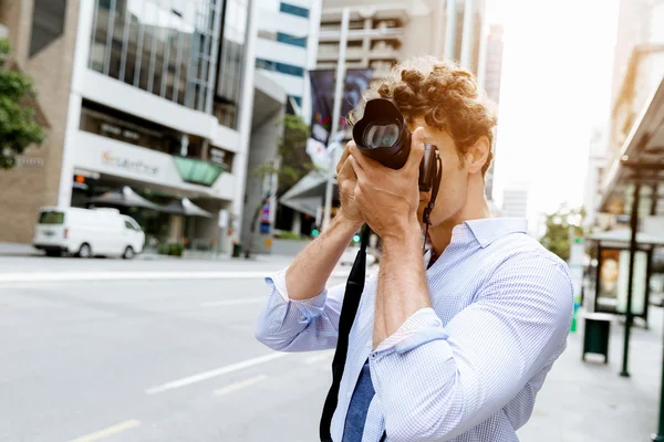 Male photographer taking picture — Stock Photo, Image