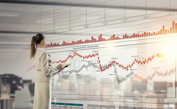 Businesswoman in modern office interior  .  Mixed media — Stock Photo, Image