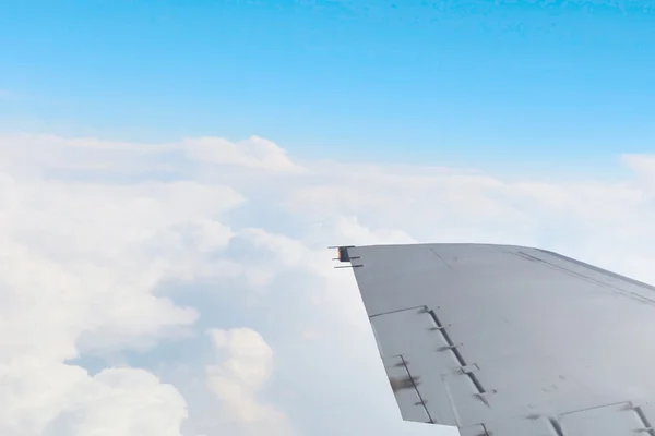 Airplane wing out of window  . Mixed media — Stock Photo, Image