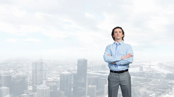 Business, people and office concept - happy smiling businessman in dark grey suit over singapore city background  . Mixed media — Stock Photo, Image