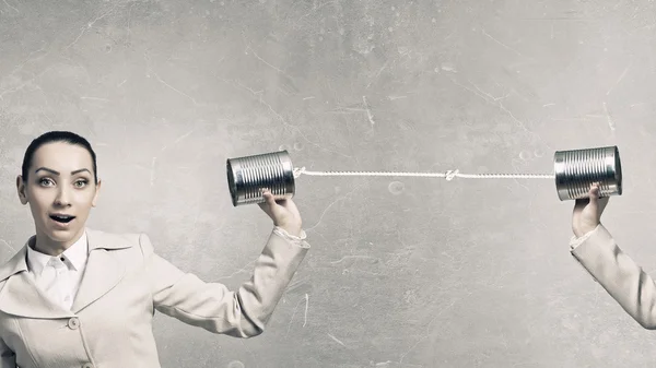 Vrouw met behulp van doven telefoon. Mixed media — Stockfoto