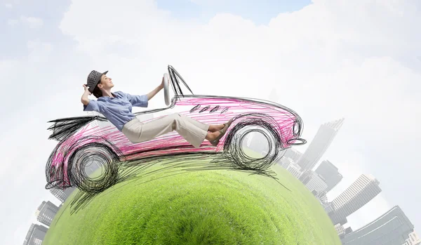 Woman driving old styled drawn car  . Mixed media — Stock Photo, Image