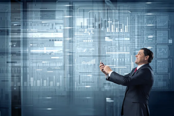 Businessman using smartphone  . Mixed media — Stock Photo, Image