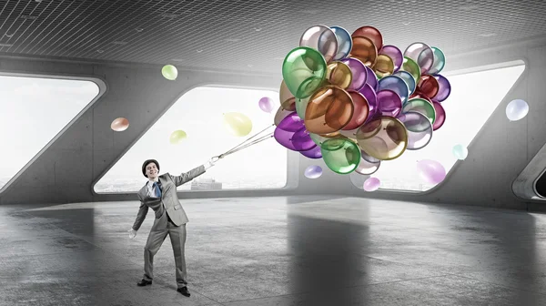 Renk balonlar komedyen adam. Karışık teknik — Stok fotoğraf