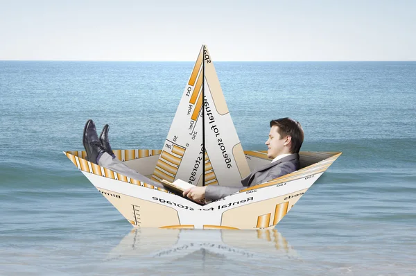On board of paper ship . Mixed media — Stock Photo, Image
