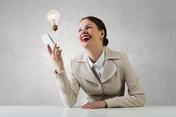 Attractive businesswoman having mobile conversation . Mixed media — Stock Photo, Image