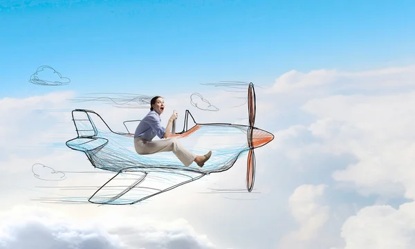 Woman in drawn airplane . Mixed media — Stock Photo, Image