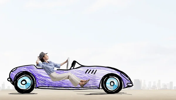 Woman driving old styled drawn car . Mixed media — Stock Photo, Image