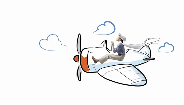 Woman in drawn airplane . Mixed media — Stock Photo, Image