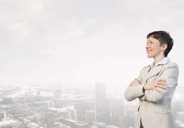 Una exitosa mujer de negocios sonriente. Medios mixtos —  Fotos de Stock