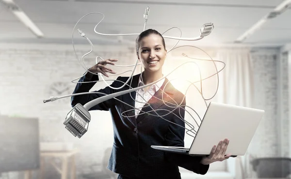 Woman with laptop in hands  . Mixed media — Stock Photo, Image