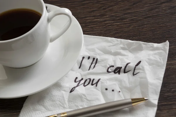 Xícara de café e guardanapo com mensagem — Fotografia de Stock