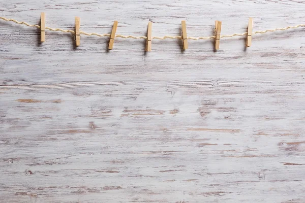 Dřevěné clothespins na laně — Stock fotografie