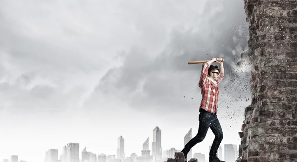 Hipster guy with bat . Mixed media — Stock Photo, Image