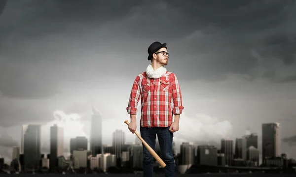 Hipster guy with bat . Mixed media — Stock Photo, Image