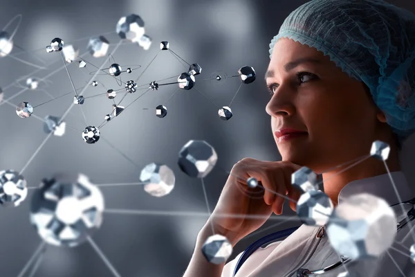 Vrouwelijke arts en nieuwe technologieën. Mixed media — Stockfoto