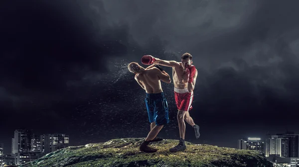 Box fighters trainning outdoor . Mixed media — Stock Photo, Image