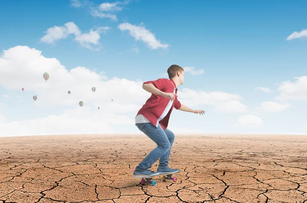 Junge fahren Skateboard. Gemischte Medien — Stockfoto