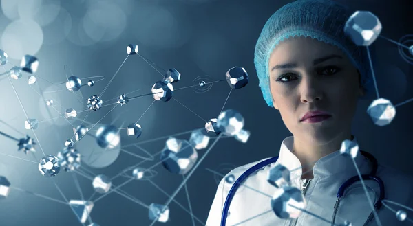 Vrouwelijke arts en nieuwe technologieën. Mixed media — Stockfoto