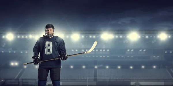 Hockey player on ice  . Mixed media — Stock Photo, Image