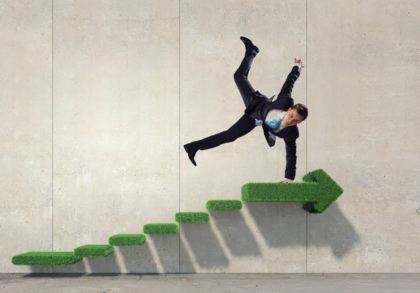 Optimistic dancing businessman . Mixed media — Stock Photo, Image