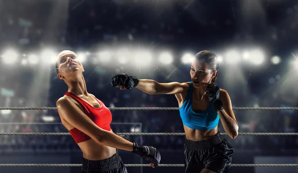 Girls boxing in ring . Mixed media — Stock Photo, Image