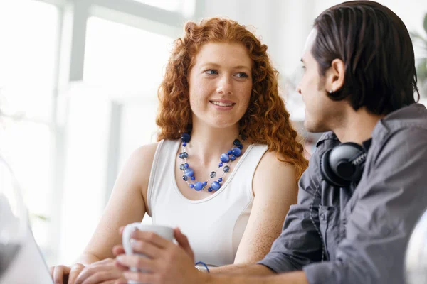 Two young people in office — Stock Photo, Image