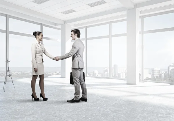 Obchodní partneři handshake. Kombinovaná technika — Stock fotografie