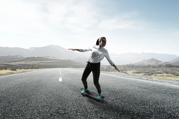 Girl ride skateboard . Mixed media — Stock Photo, Image