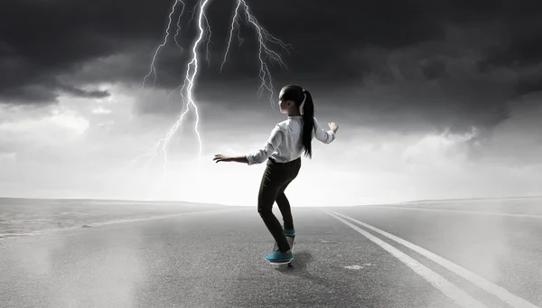 Girl ride skateboard . Mixed media — Stock Photo, Image