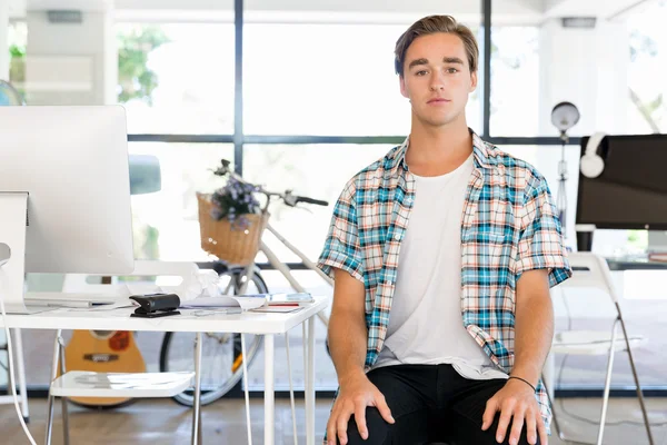 Young man working in office — Stock Photo, Image