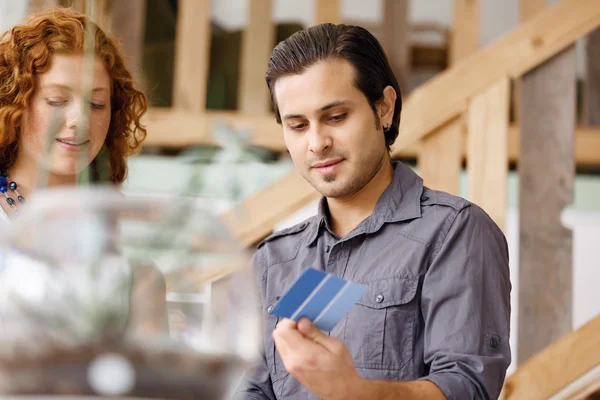 Two young people in office — Stock Photo, Image