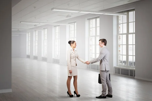 Business partners handshake . Mixed media — Stock Photo, Image