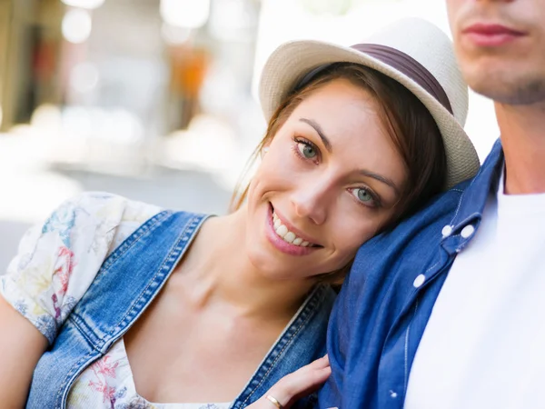 Happy young couple walking in city Stock Photo