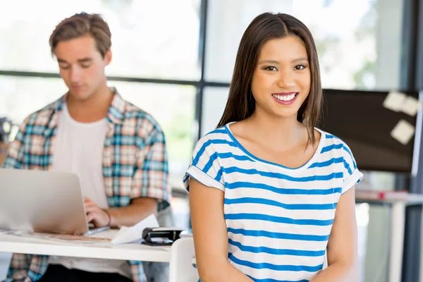 Young woman in office — Stock Photo, Image