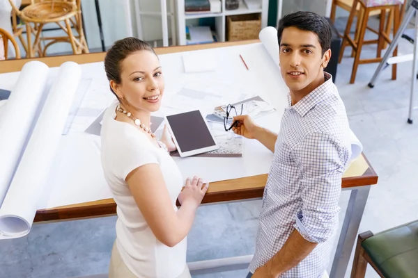 Two young architects in office — Stock Photo, Image
