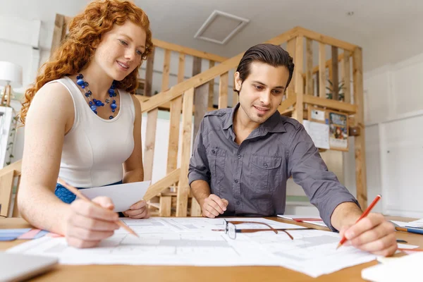 Two young architects in office — Stock Photo, Image