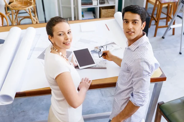 Two young architects in office Royalty Free Stock Images