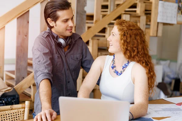 Two young people in office — Stock Photo, Image