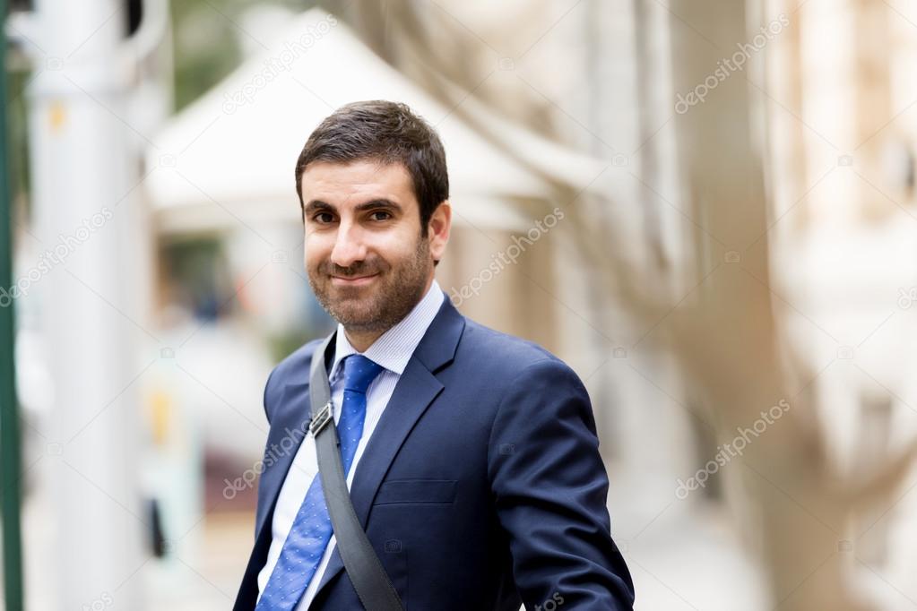 Portrait of handsome businessman outdoor