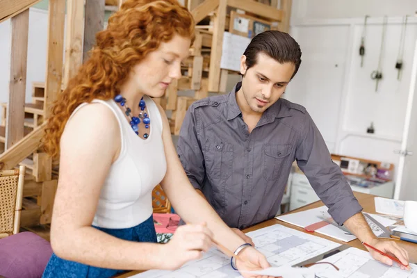 Two young architects in office — Stock Photo, Image