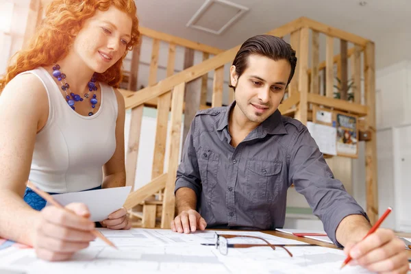 Two young architects in office — Stock Photo, Image