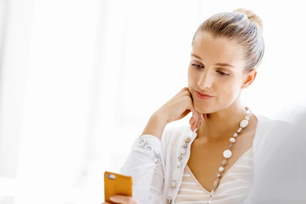 Attractive office worker sitting at desk — Stock Photo, Image