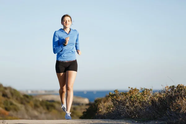 Sport runner jogging on beach working out — Stock Photo, Image