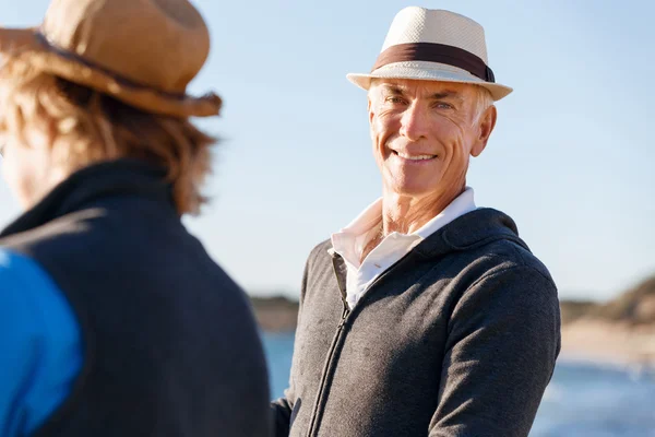 Senior man fishing with his grandson — Stock Photo, Image