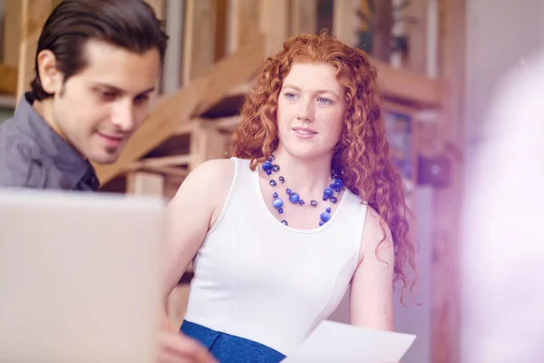 Young woman in office — Stock Photo, Image